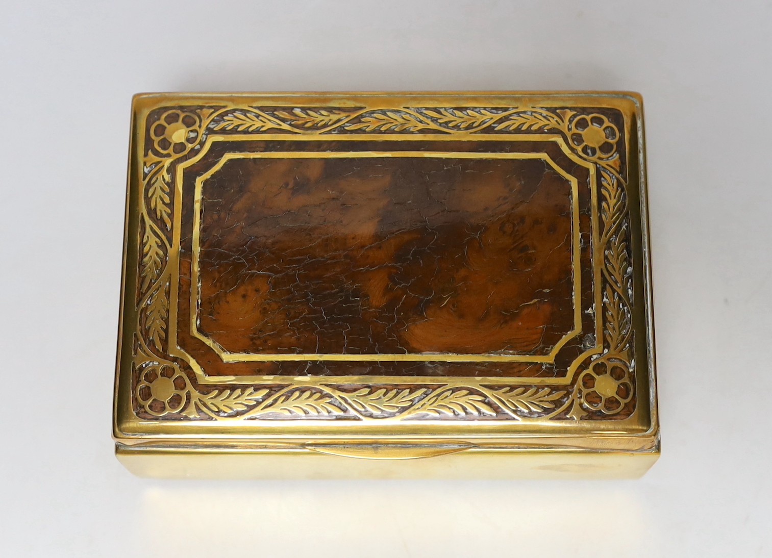 A burr oak topped brasswork cigarette box, 14cm wide, 10cm deep